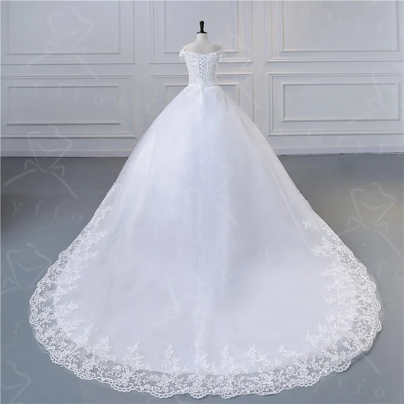 "Enchanting Elegance: Ivory Lace Boat Neck Ball Gown - Plus Size"