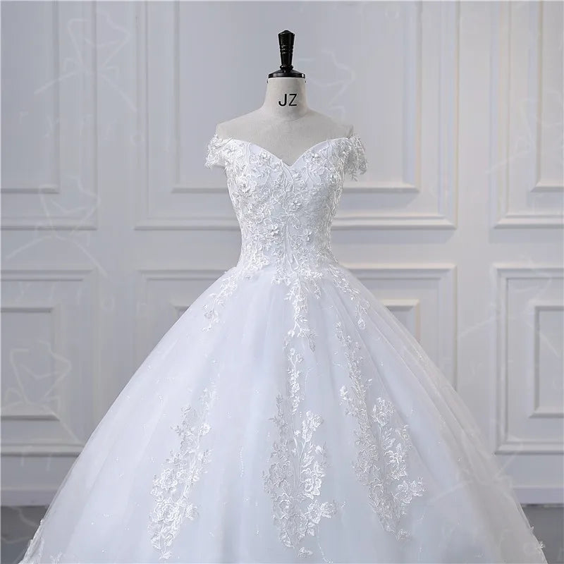 "Enchanting Elegance: Ivory Lace Boat Neck Ball Gown - Plus Size"